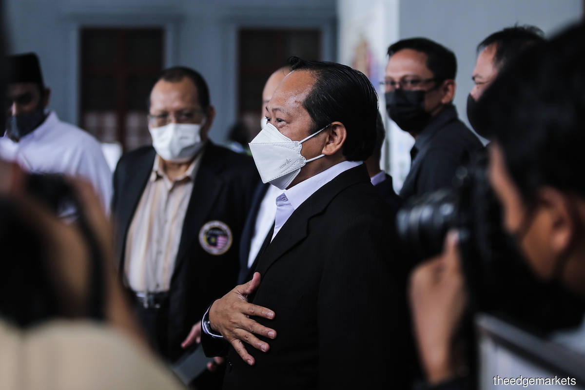 Ahmad (centre) leaving the Kuala Lumpur Courts Complex on Wednesday (Sept 29). He was first charged on Jan 20 last year. (Photo by Zahid Izzani Mohd Said/The Edge)