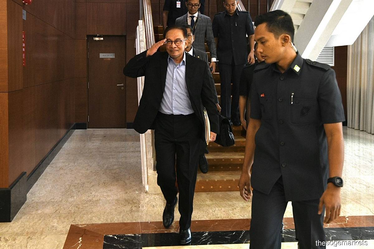 Prime Minister Datuk Seri Anwar Ibrahim (front, left) seen at the Parliament House of Malaysia at Taman Duta, Kuala Lumpur on Tuesday, Feb 21, 2023. (Photo credit: Shahrill Basri/The Edge)