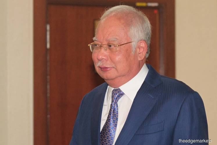 I feel 'defended' by PAC report, says Najib
