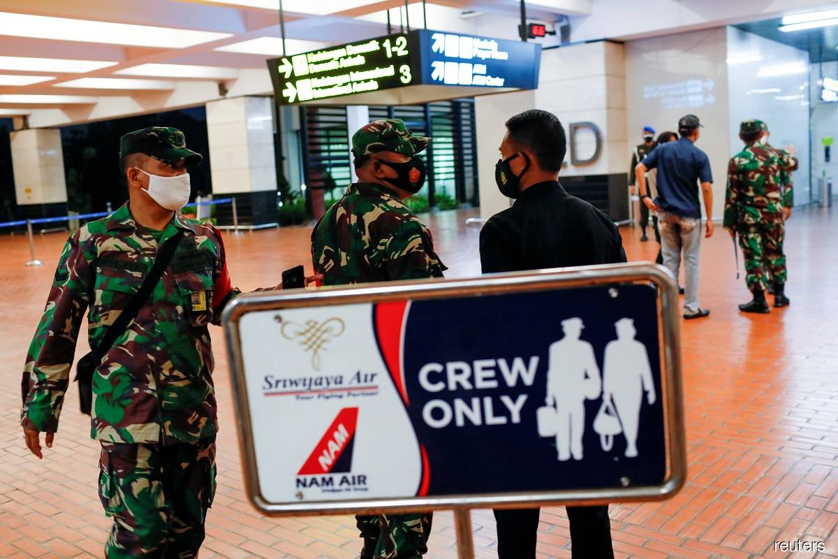 Indonesian plane loses contact after take-off, with more than 60 thought to be aboard
