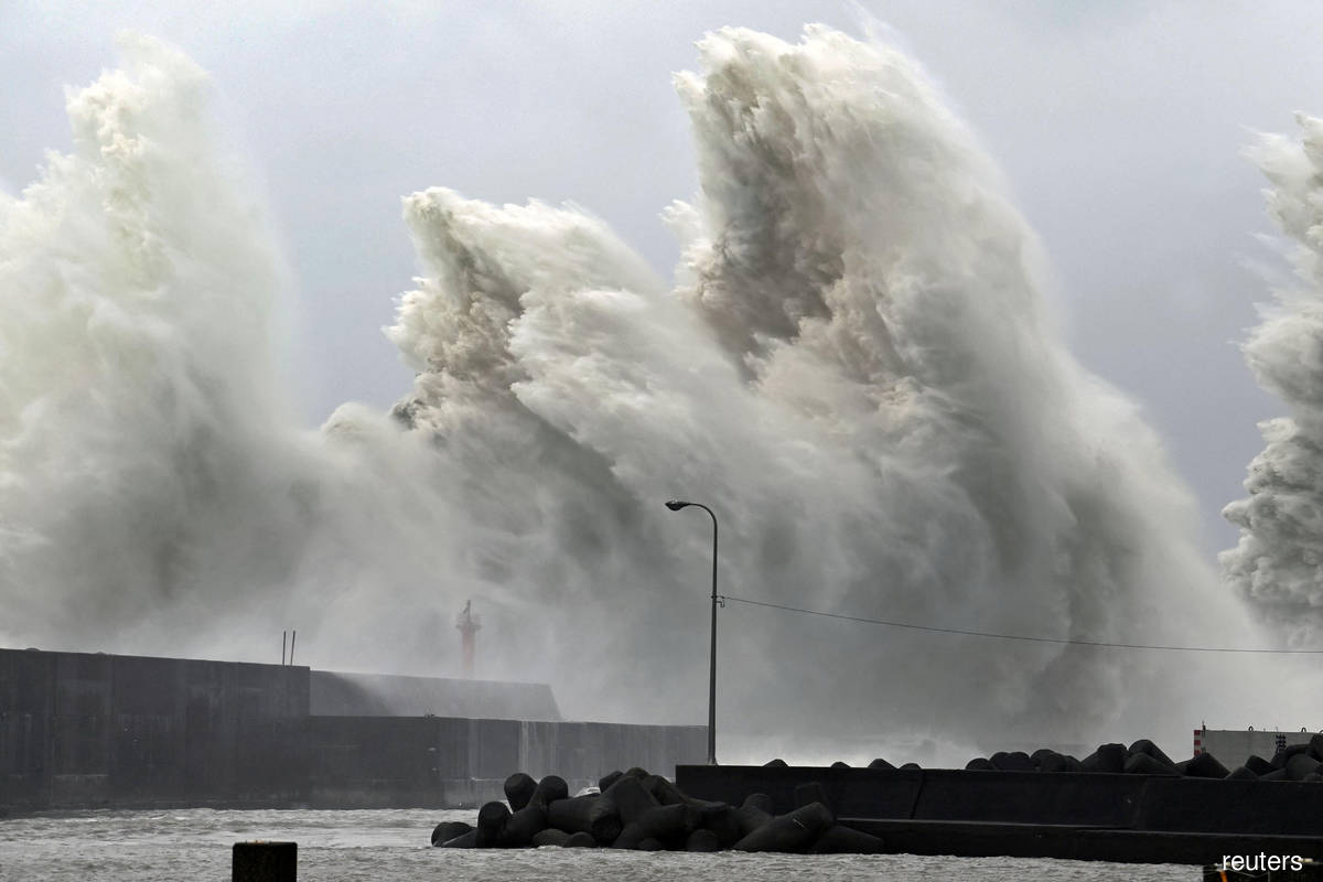 Typhoon batters Japan with record rain, killing two — NHK The Edge