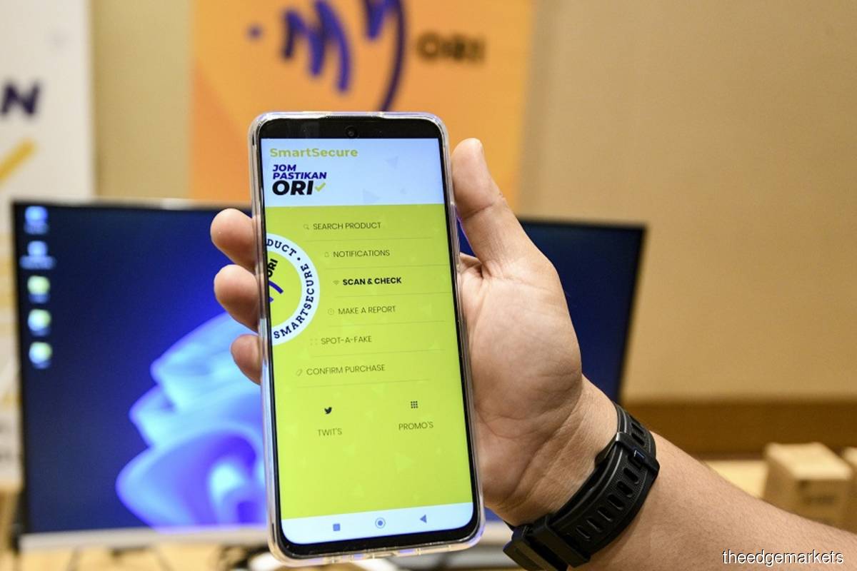The MyORI SmartSecure platform as seen on a mobile phone at the launching ceremony today at Zenith Hotel, Putrajaya. (Photo by Shahrill Basri/The Edge)