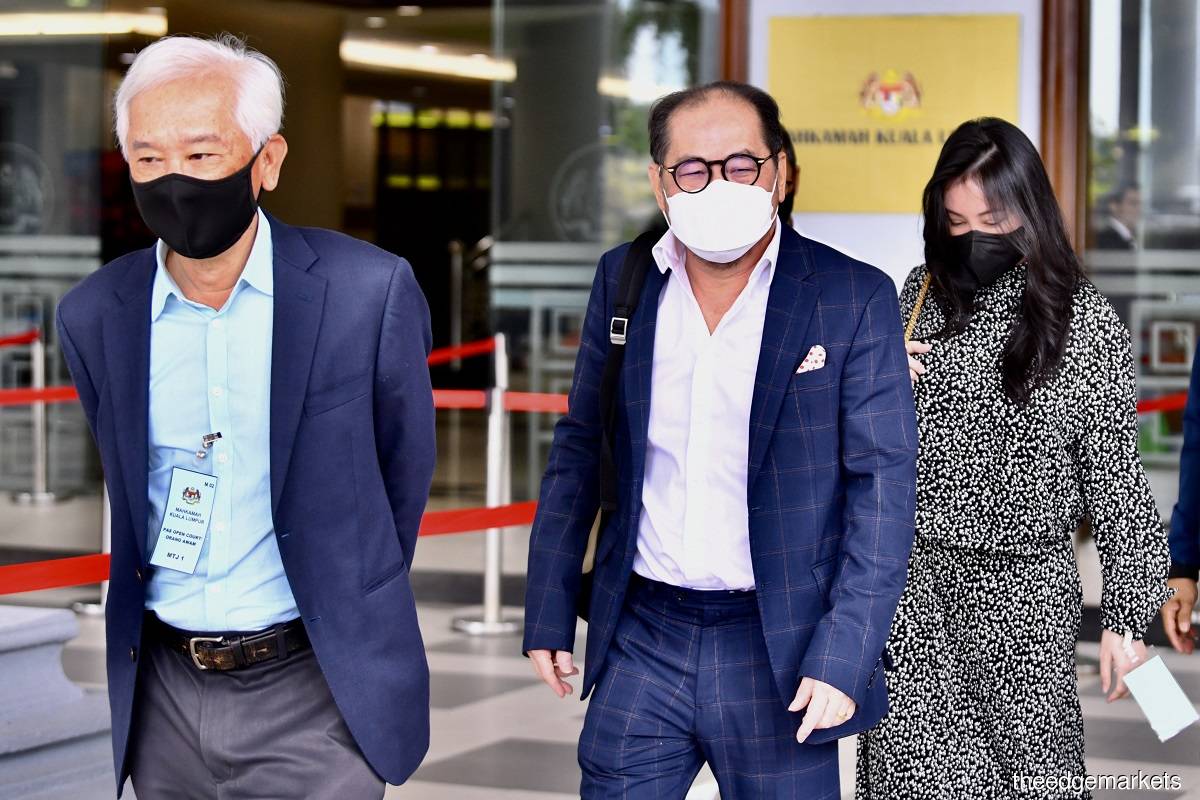 (From left) The Edge Media Group publisher and chief executive officer Datuk Ho Kay Tat, chairman Tan Sri Tong Kooi Ong, and Puan Sri Dawn Cheong at the Kuala Lumpur Courts Complex on Nov 21, 2022. Photo by Sam Fong/The Edge