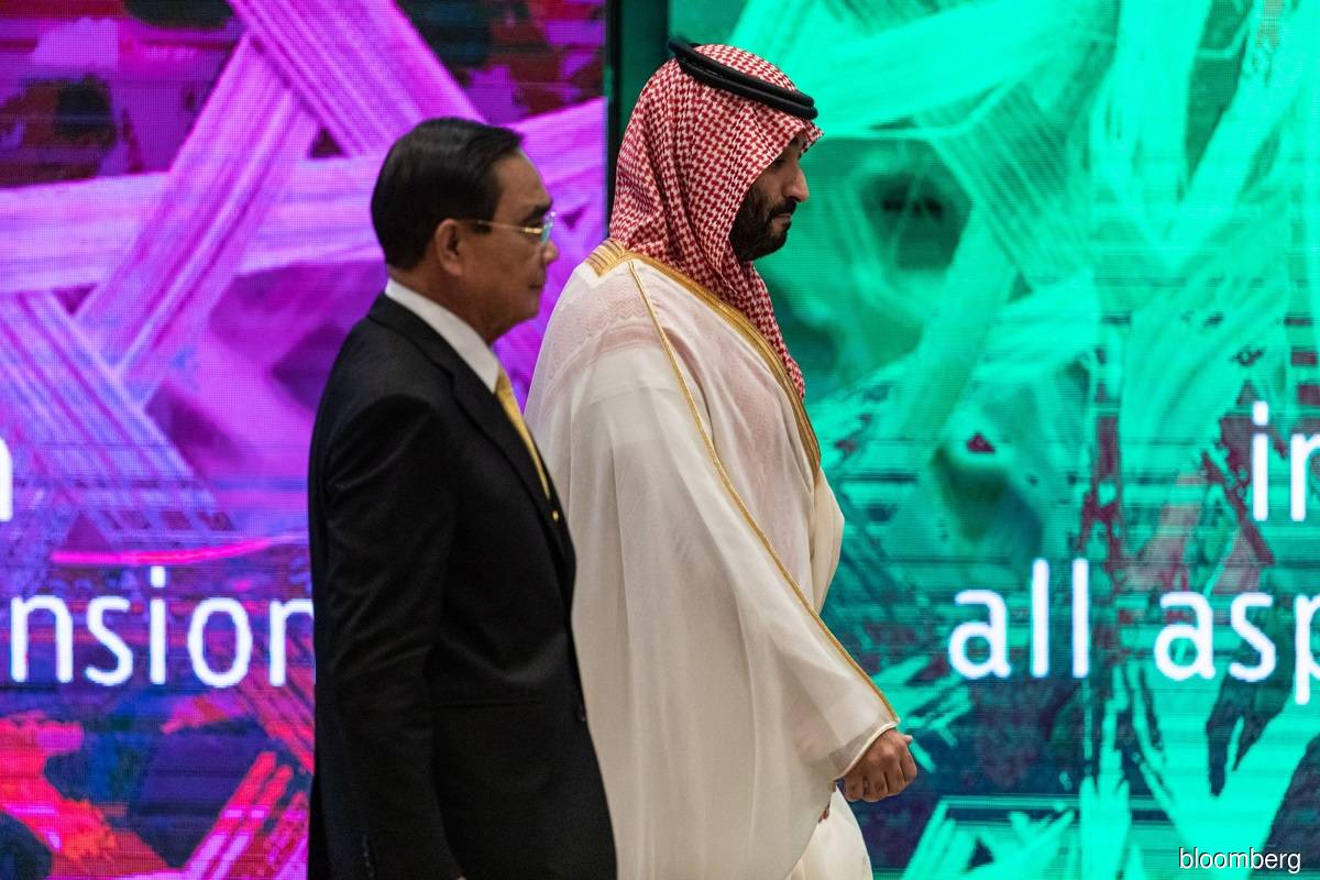 Thailand Prime Minister Prayuth Chan-Ocha (left) and Saudi Arabia Crown Prince (right) at the Asia-Pacific Economic Cooperation Economic Leader's Meeting held in Bangkok, Thailand on Nov 18, 2022.