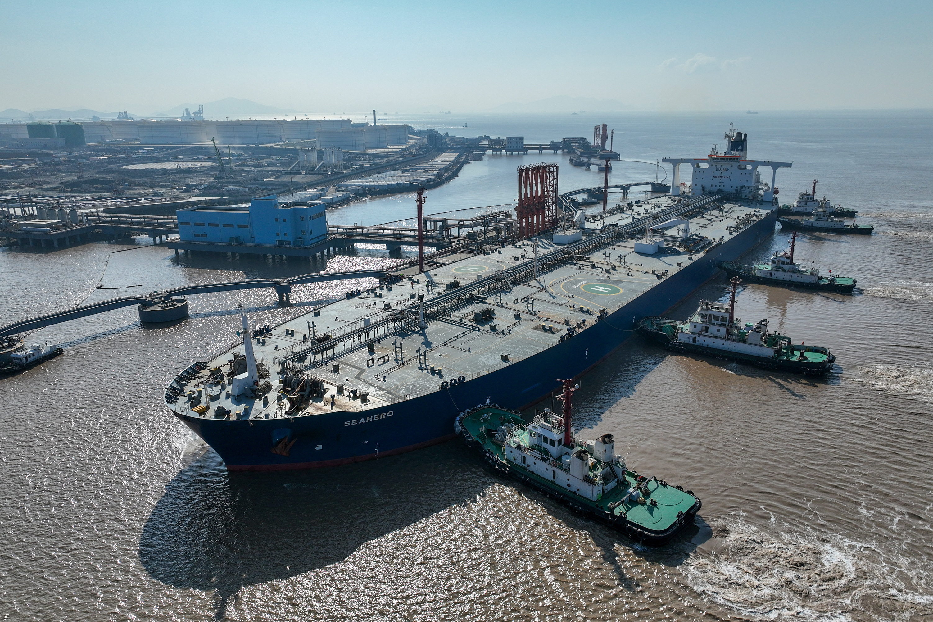 An aerial view shows a crude oil tanker at an oil terminal off Waidiao island in Zhoushan, Zhejiang province, China on January 4, 2023. (China Daily via Reuters)