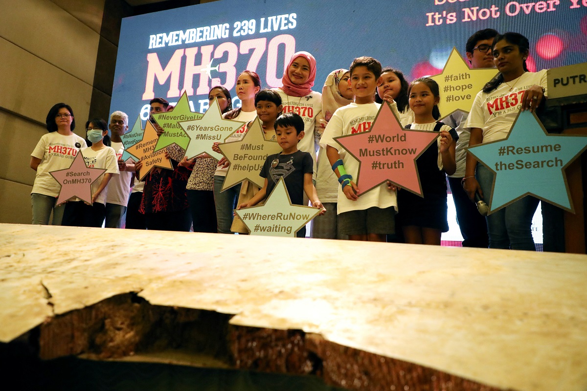 Nine years on, families urge new search for missing Malaysia plane MH370