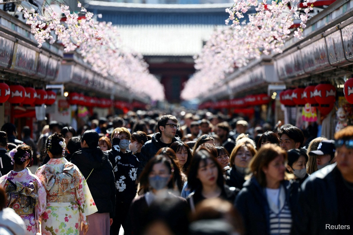 Japan tourist arrivals rise to record in December despite China drop