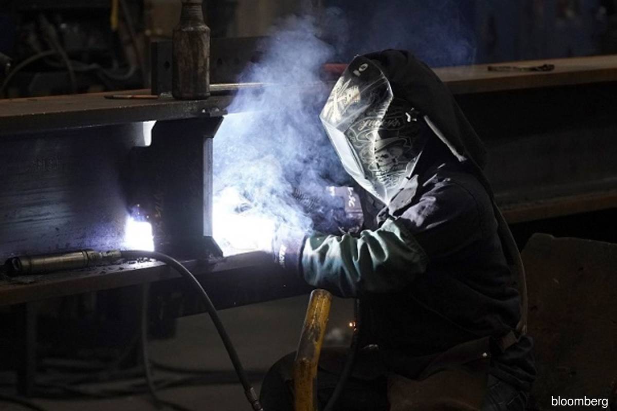 US manufacturing presses ahead; labour market gaining traction