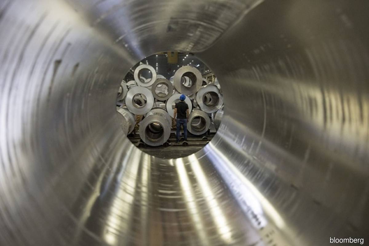 Shortages help aluminium towards 13-year highs
