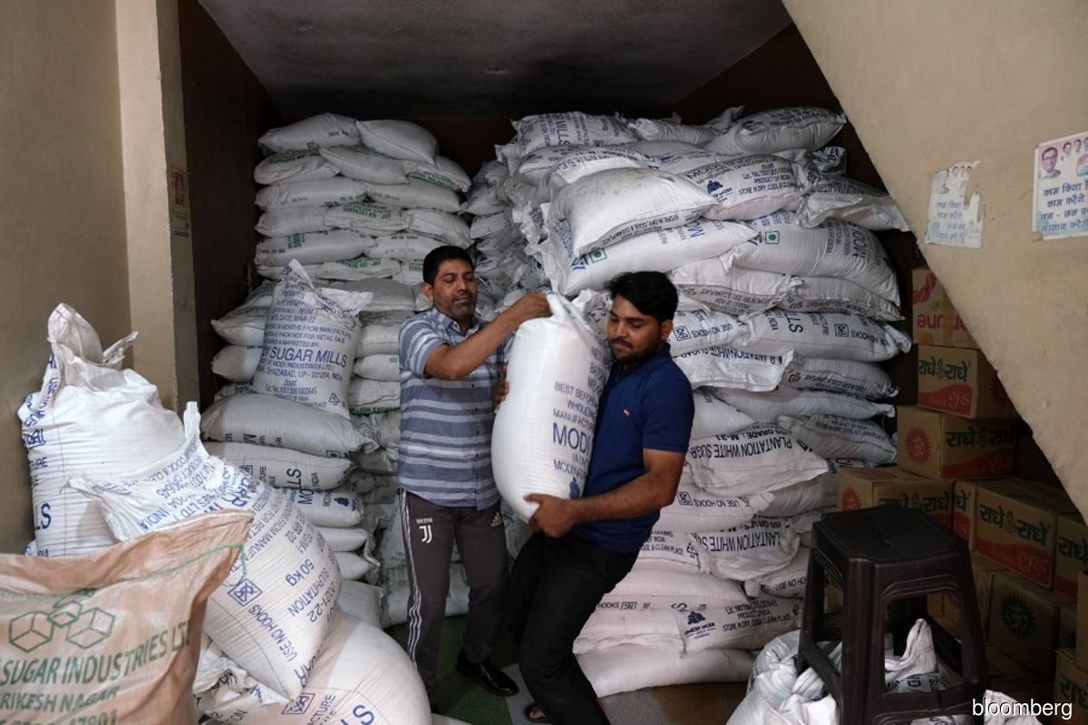 India mills renegotiate, default on sugar export deals to catch rising prices, say dealers