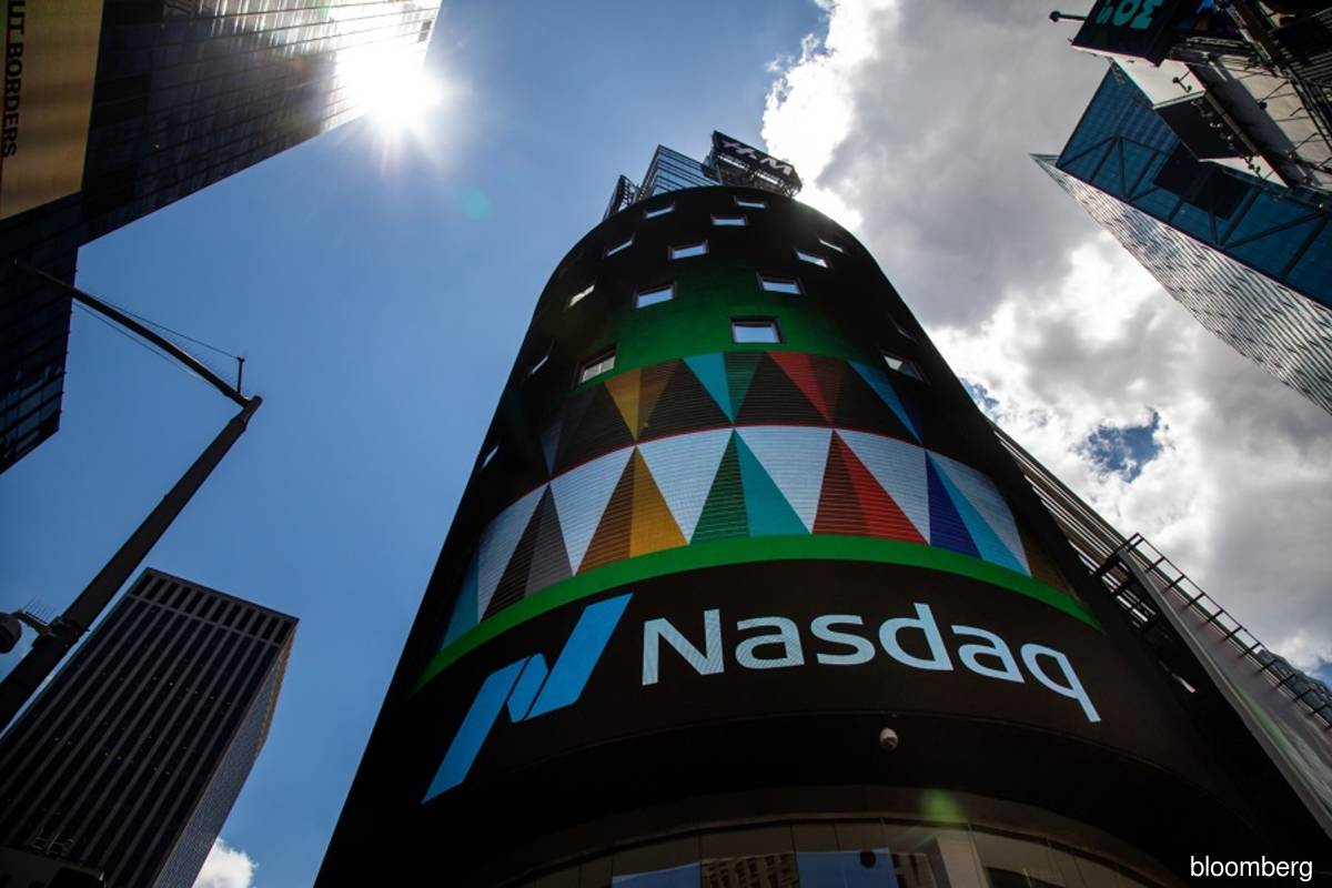 Nasdaq rises as battered growth stocks show recovery signs
