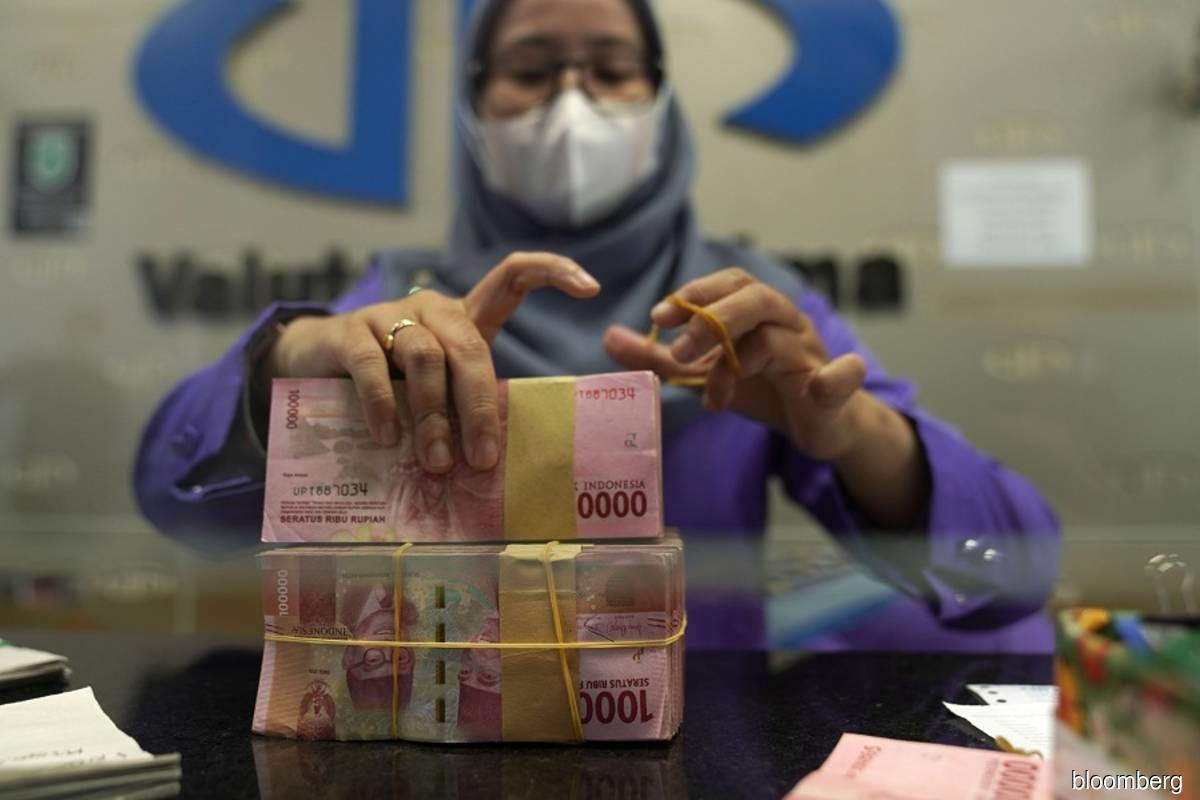 Indonesia to cut dollar reliance with rupiah near two-year low