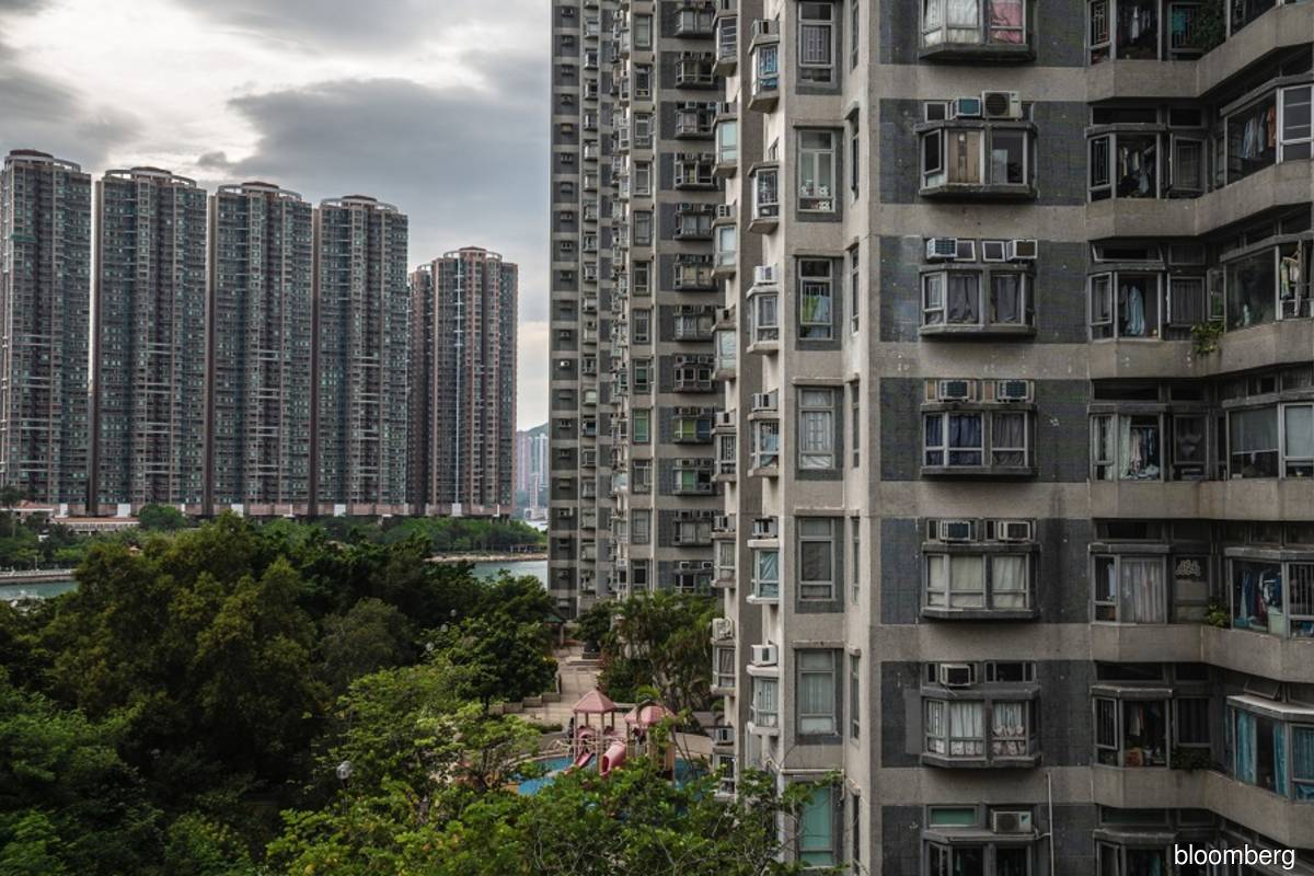 Hong Kong home prices seen falling as much as 25% from peak