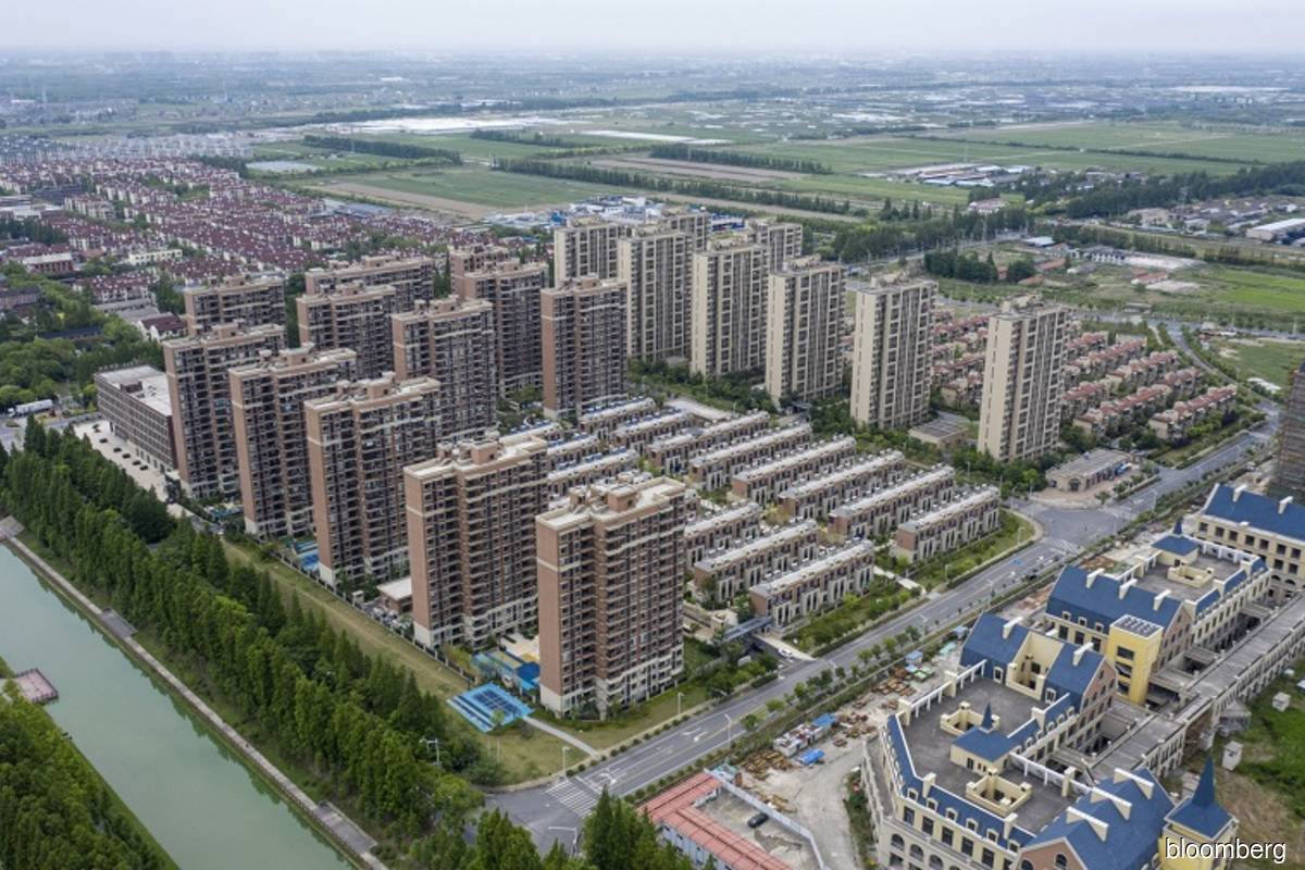 China’s top builder posts 404% bond return on policy shifts