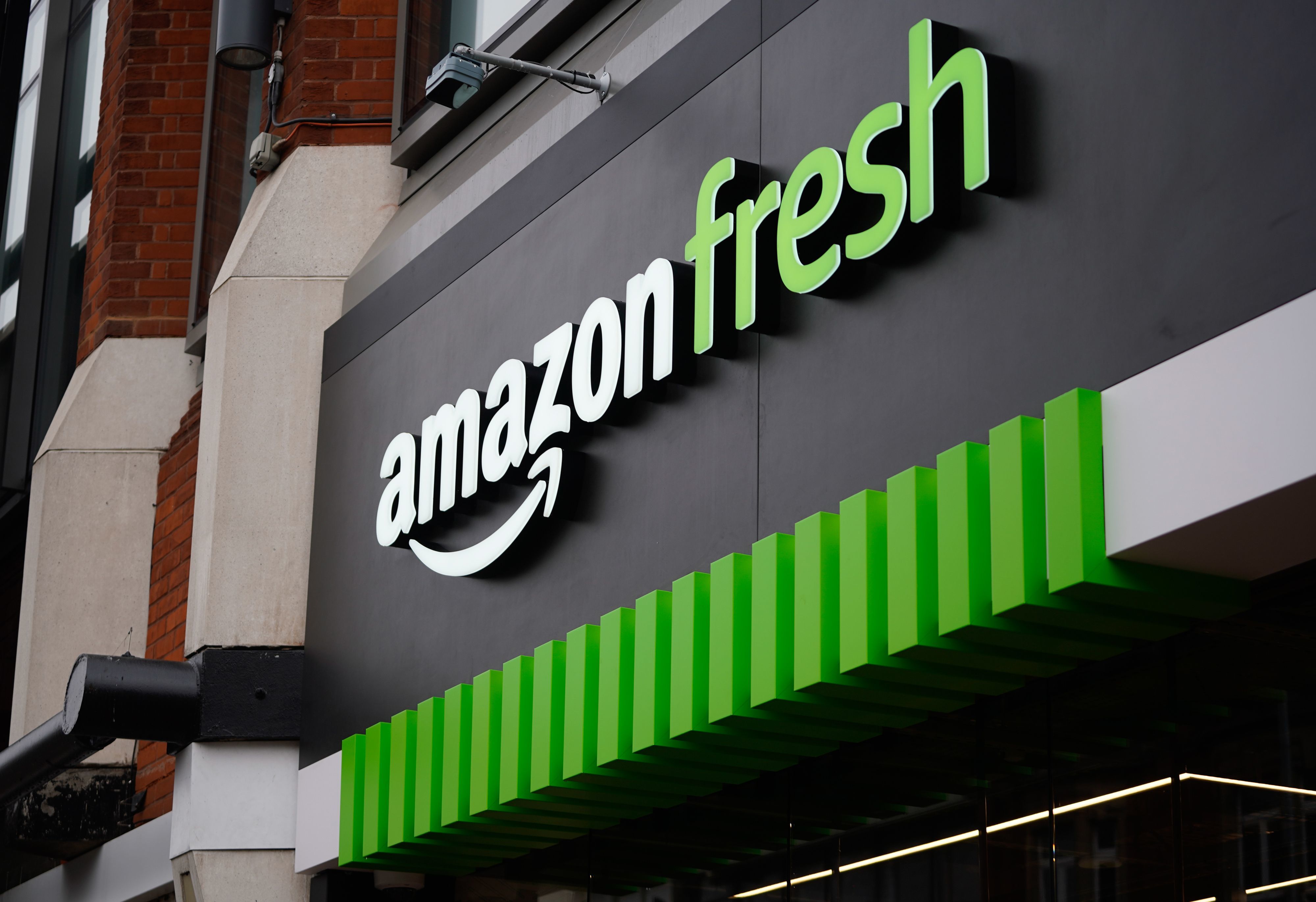 Amazon halted fresh grocery store rollout for review, CEO says