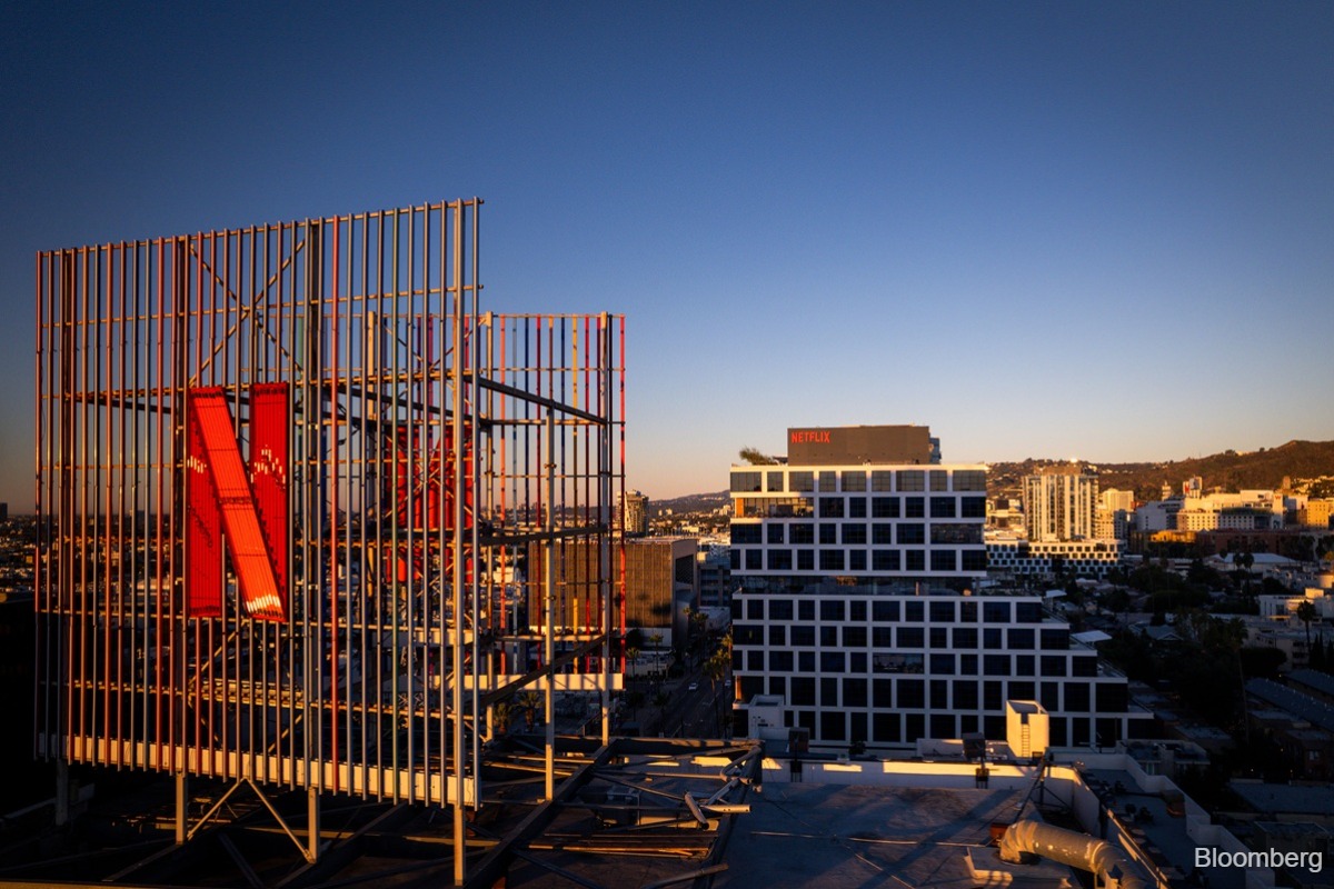 DOJ probes Netflix&rsquo;s power over filmmakers in Warner deal review