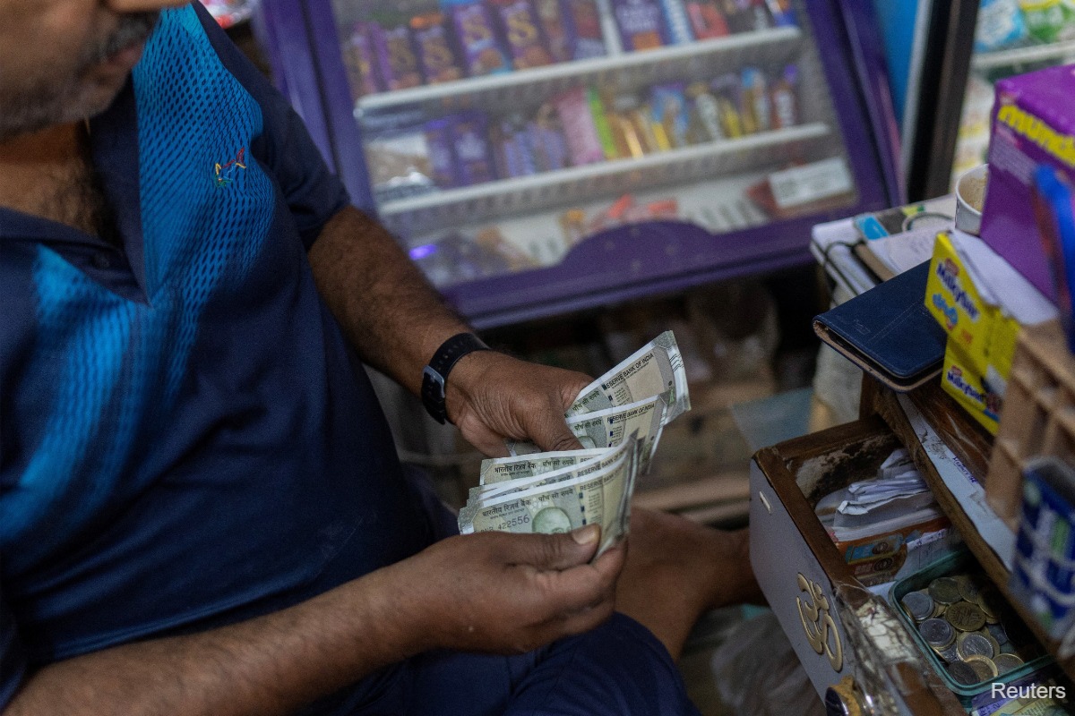 UBS cuts Indian rupee March forecast to 92, expects short-lived US trade deal relief