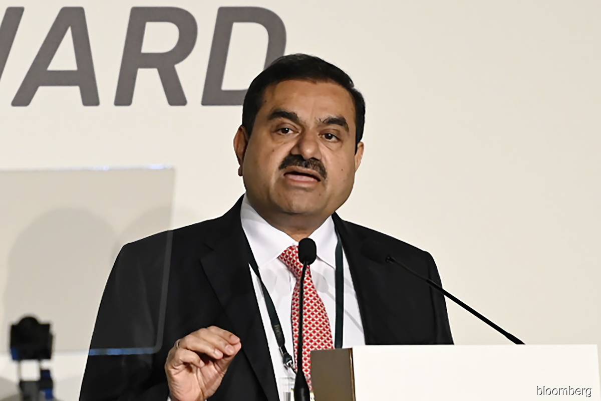 Adani in talks to pre-pay share pledges to boost confidence