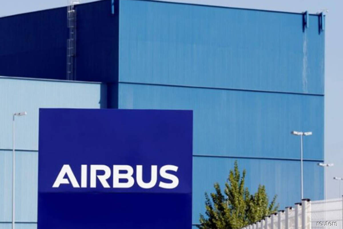 Airbus raises forecasts after strong first half