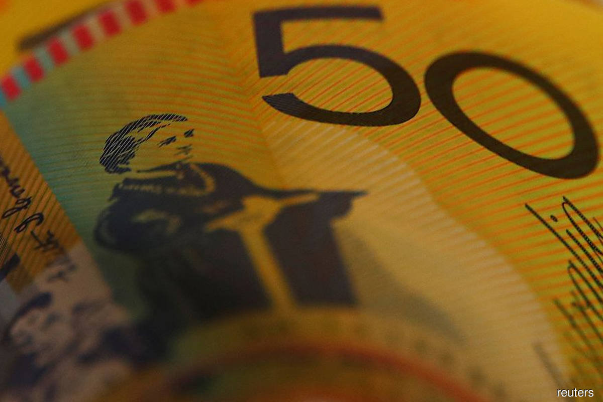 Aussie buoyant, dollar listless as Omicron optimism lifts risk assets