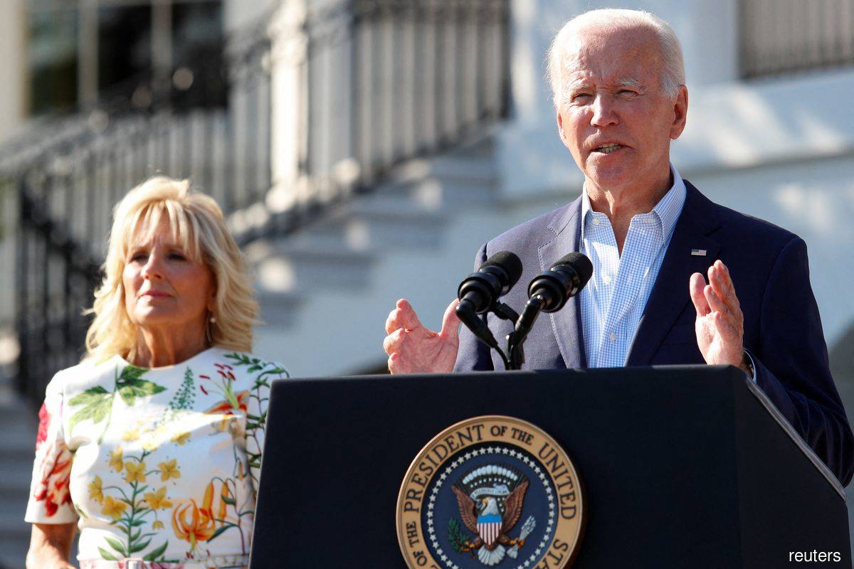 On July 4, Biden says freedoms under assault; urges 'principled patriotism'
