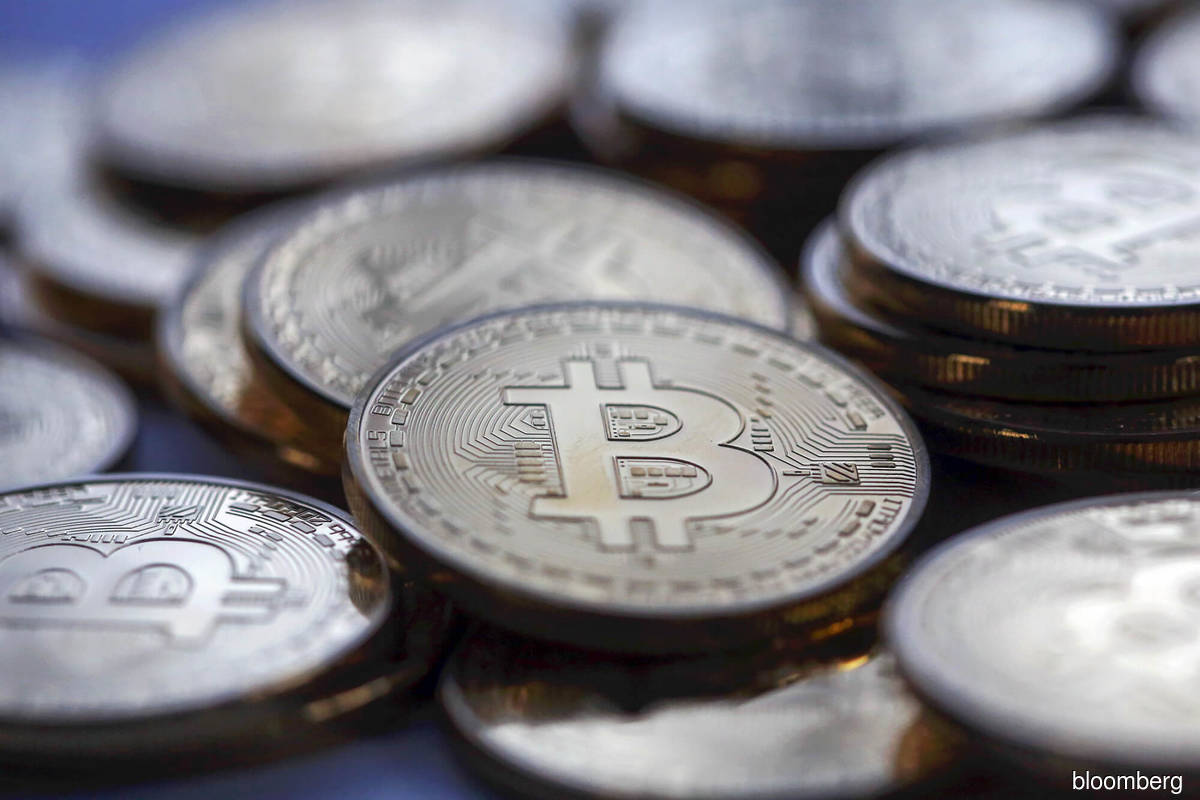 Bitcoin climbs to nine-month high as bank turmoil sparks rally