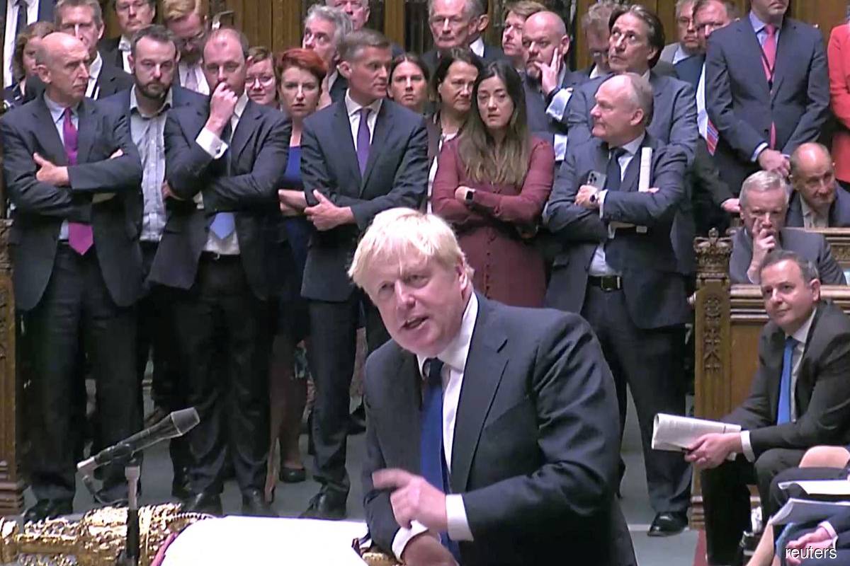 Boris Johnson 'up for a fight' as clamour to quit grows