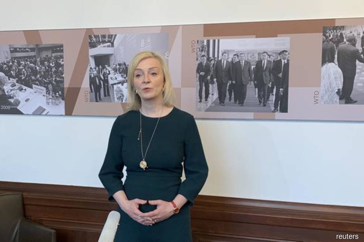 British Trade Minister Liz Truss speaks to Reuters, after her meeting with World Trade Organization Director-General Ngozi Okonjo-Iweala on Friday, April 30, 2021 in Geneva, Switzerland. (Photo credit: Cecile Mantovani/Reuters)