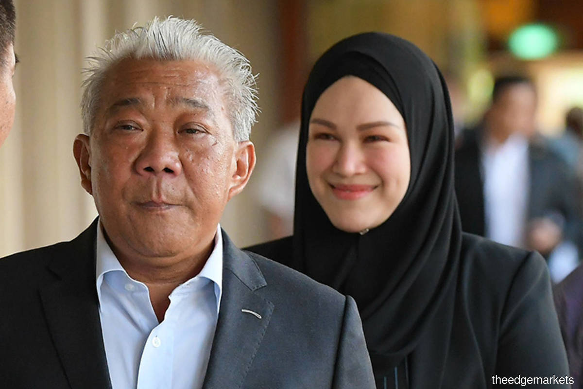 Datuk Seri Bung Moktar Radin (front, left) and wife Datin Seri Zizie Izette Abdul Samad (The Edge filepix) 