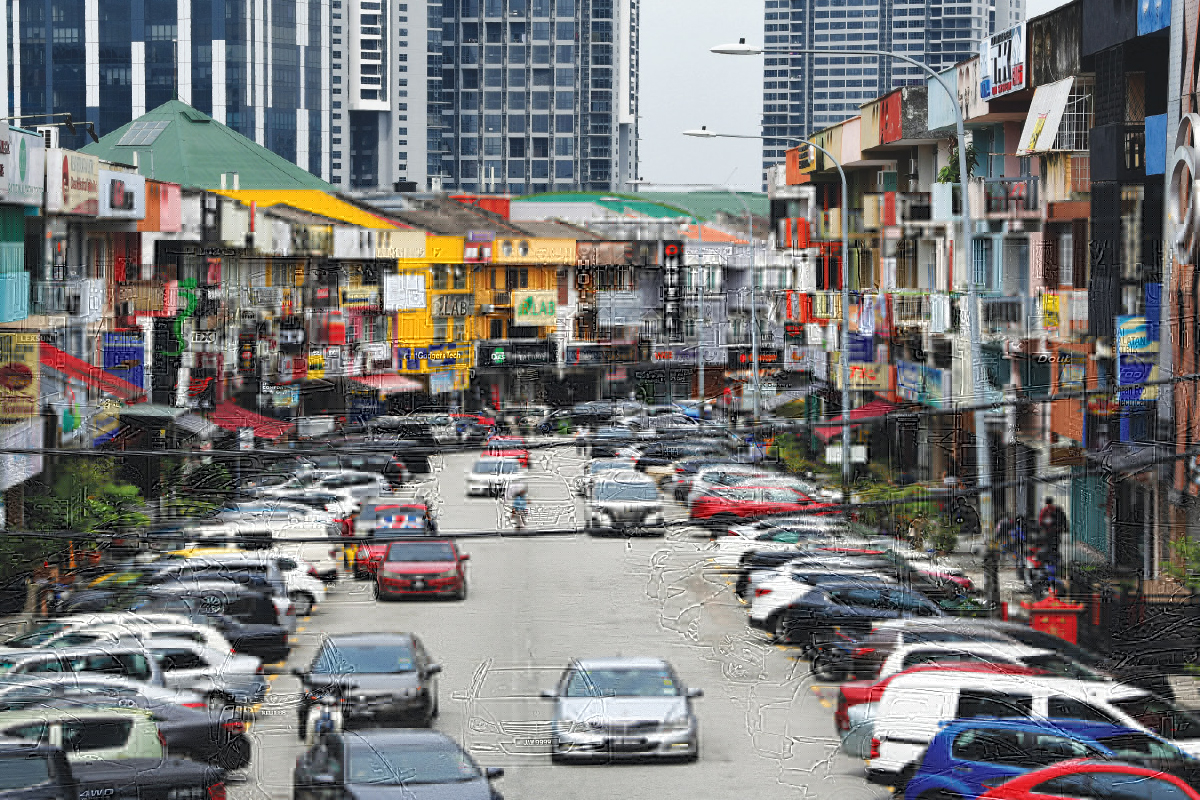 The Jalan Manis area is always congested, with many cars double parked on both sides of the road (Photo by Patrick Goh/The Edge)