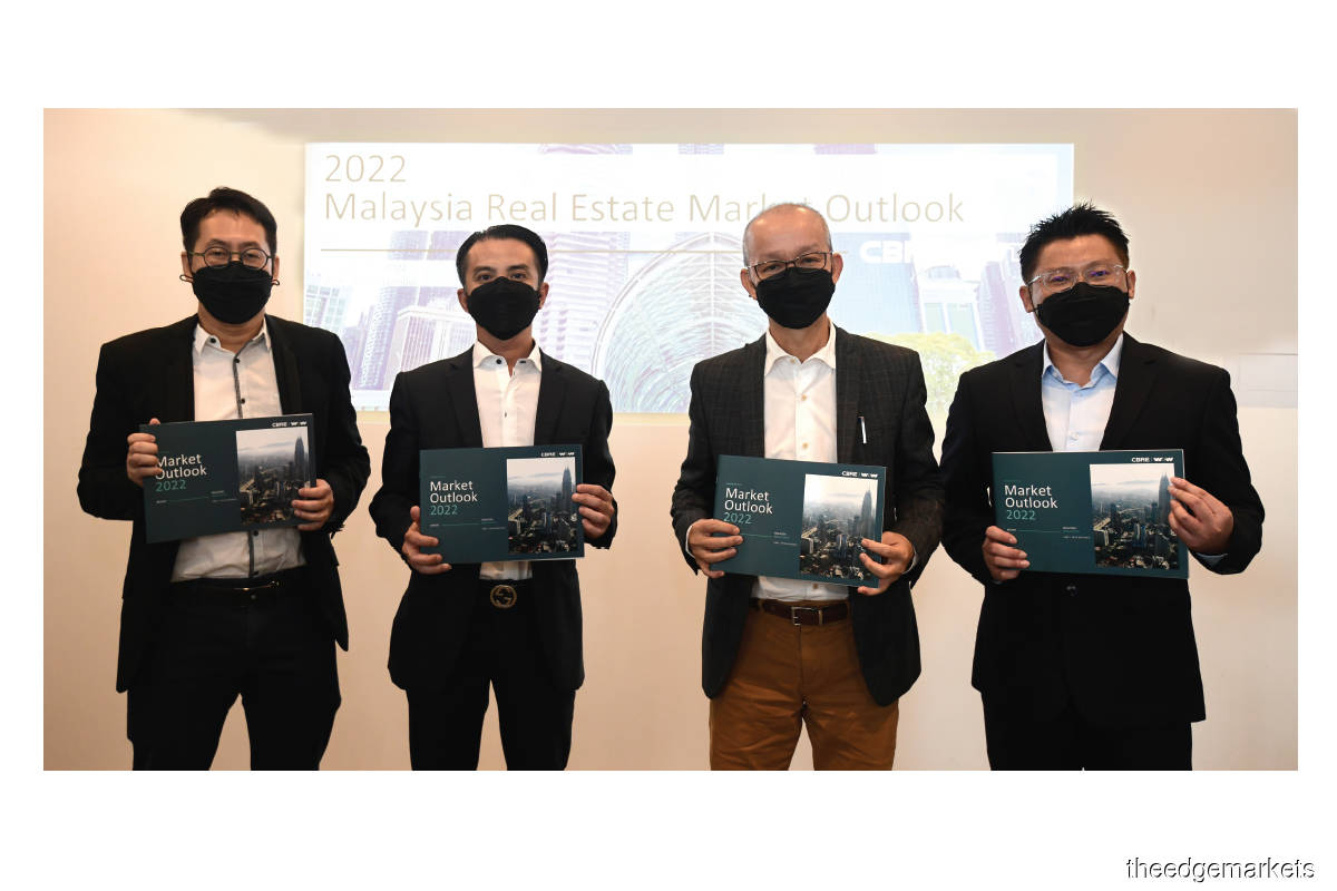 (From left) Peh, Tan, Foo and Lo presenting the  CBRE | WTW 2022 Market Outlook Report (Photo by Patrick Goh/The Edge)