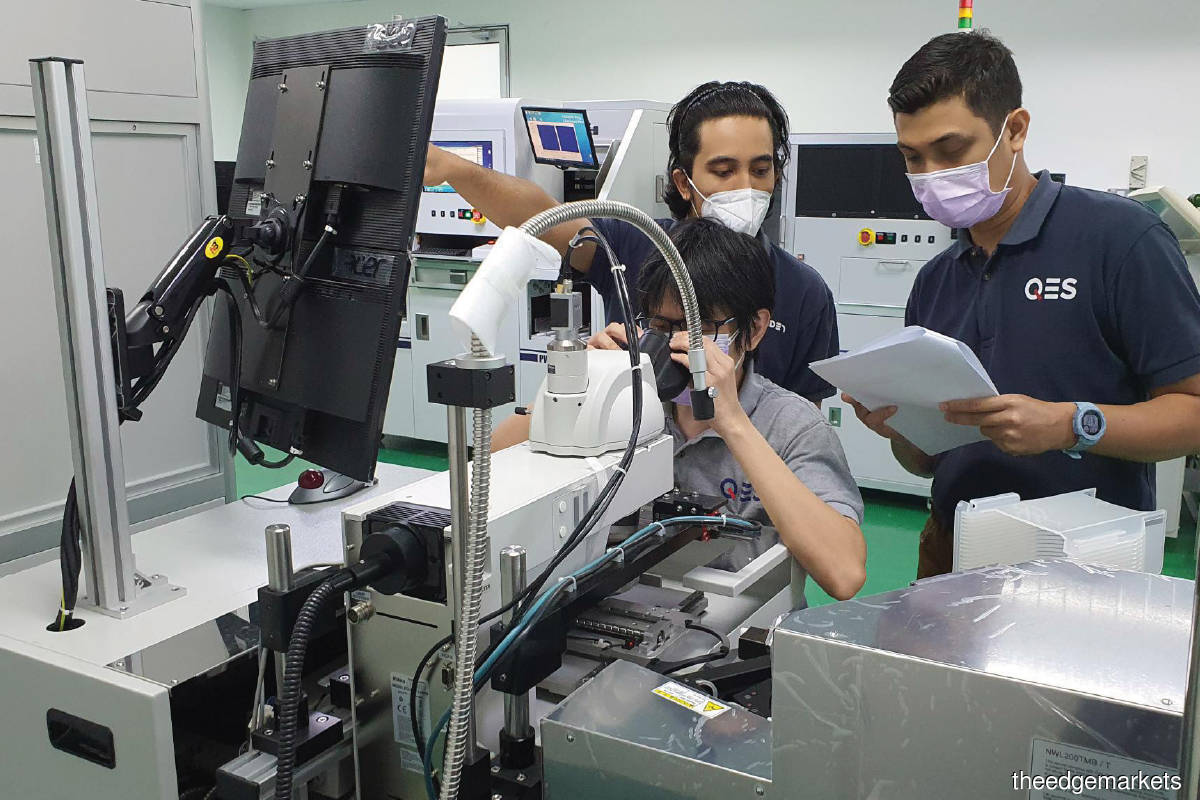 QES engineers carrying out quality assurance testing and optimising equipment prior to shipping them out. (Photo by QES)
