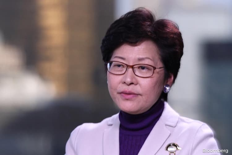 Hong Kong leader Carrie Lam apologises as protesters press 