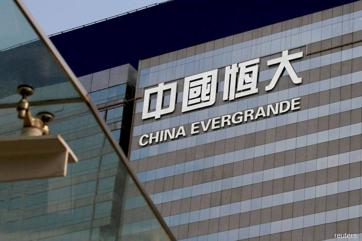Investors grappling with Evergrande fallout weigh risk of wider pain