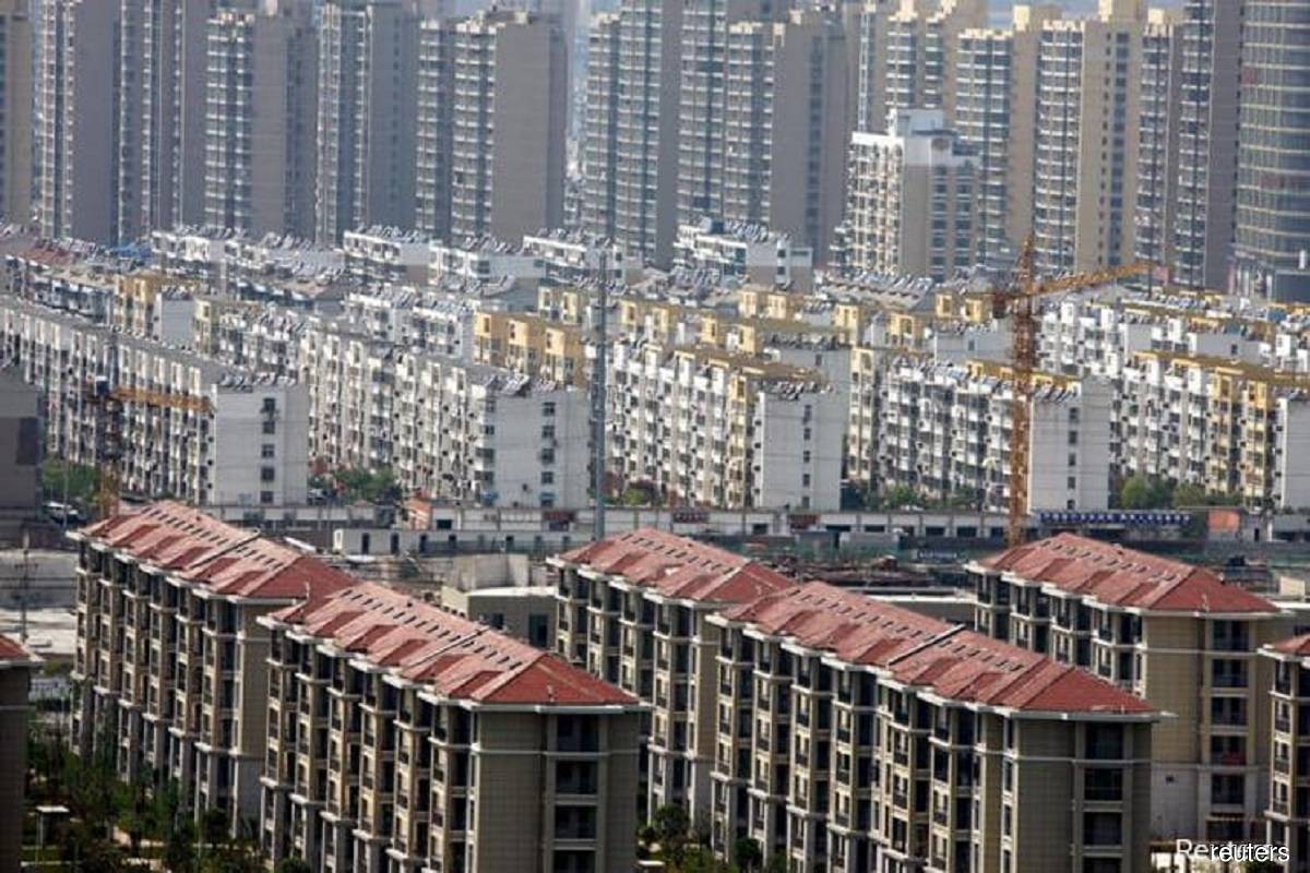 Chinese banks face US$200b in losses from property, UBS says