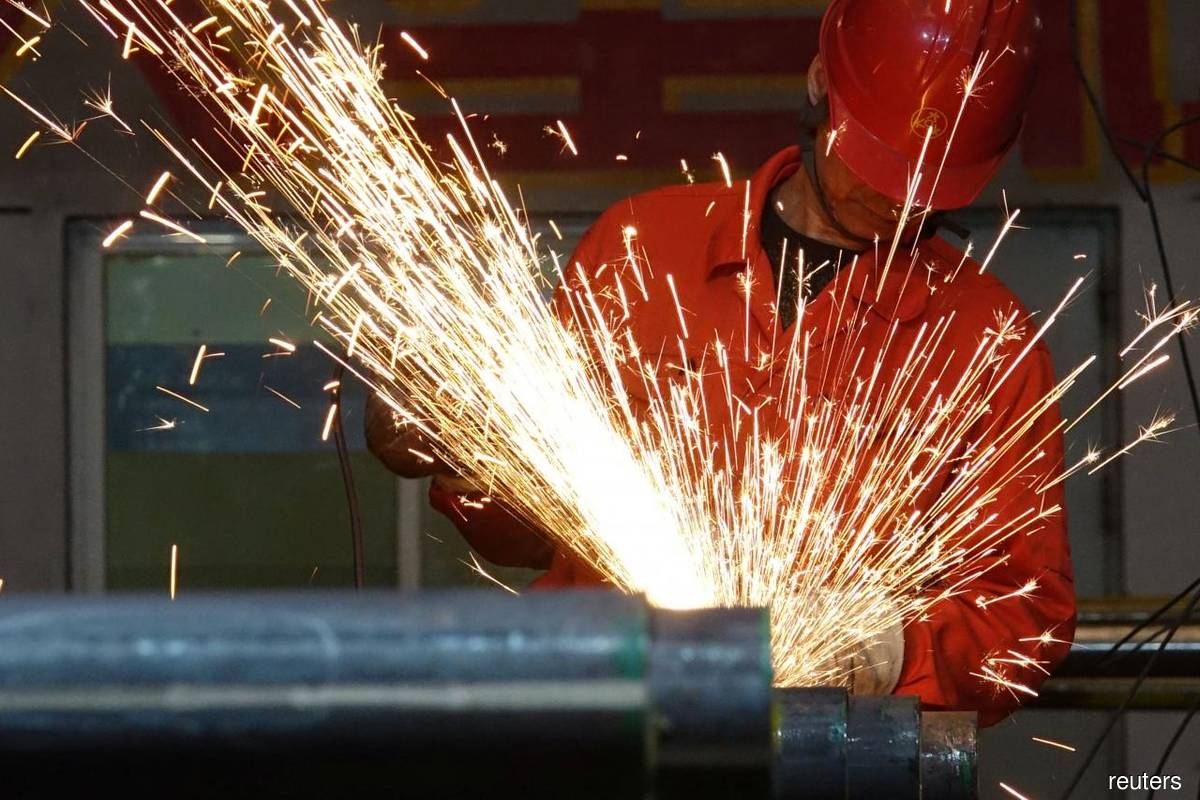 China considering tax breaks for manufacturers as economy cools — source