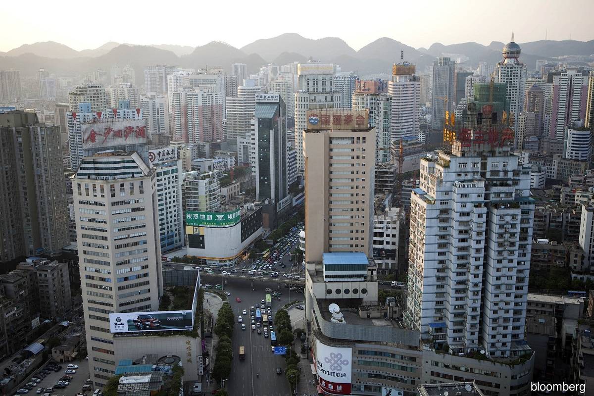 Property firms in China over the last couple of years have either struggled to sell new houses or have sold them at lower prices than expected, with Covid lockdowns further exacerbating the woes for the sector. (Bloomberg pic)
