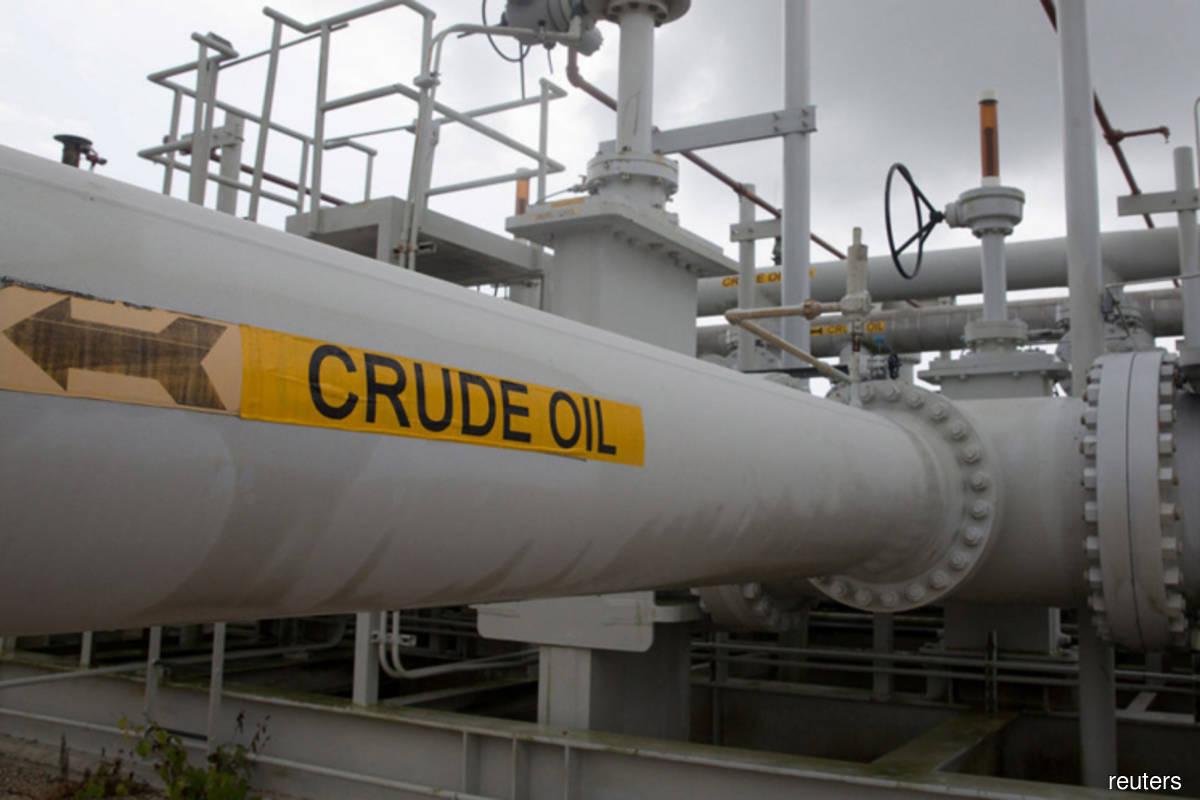 Oil climbs for third day on subdued dollar, US crude stocks' drop