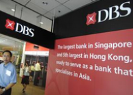 DBS sees benefits as yuan devaluation weakens Singapore dollar