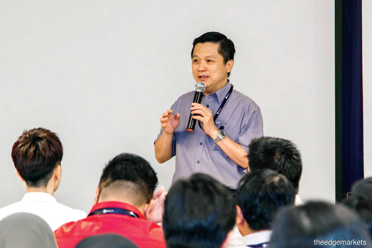 Yew conducting training for employees. Those who are interested in furthering their career with the company undergo a nine-level development programme.