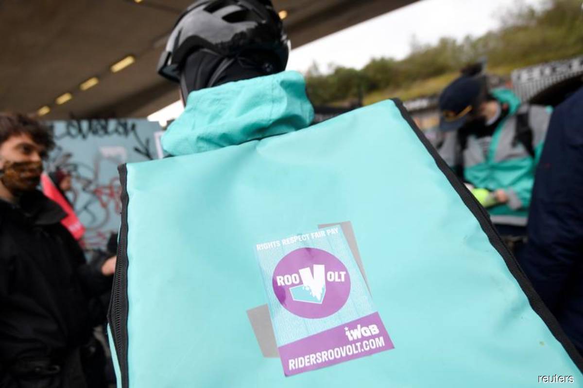 Deliveroo rises as retail investors join trading, riders demand fair pay