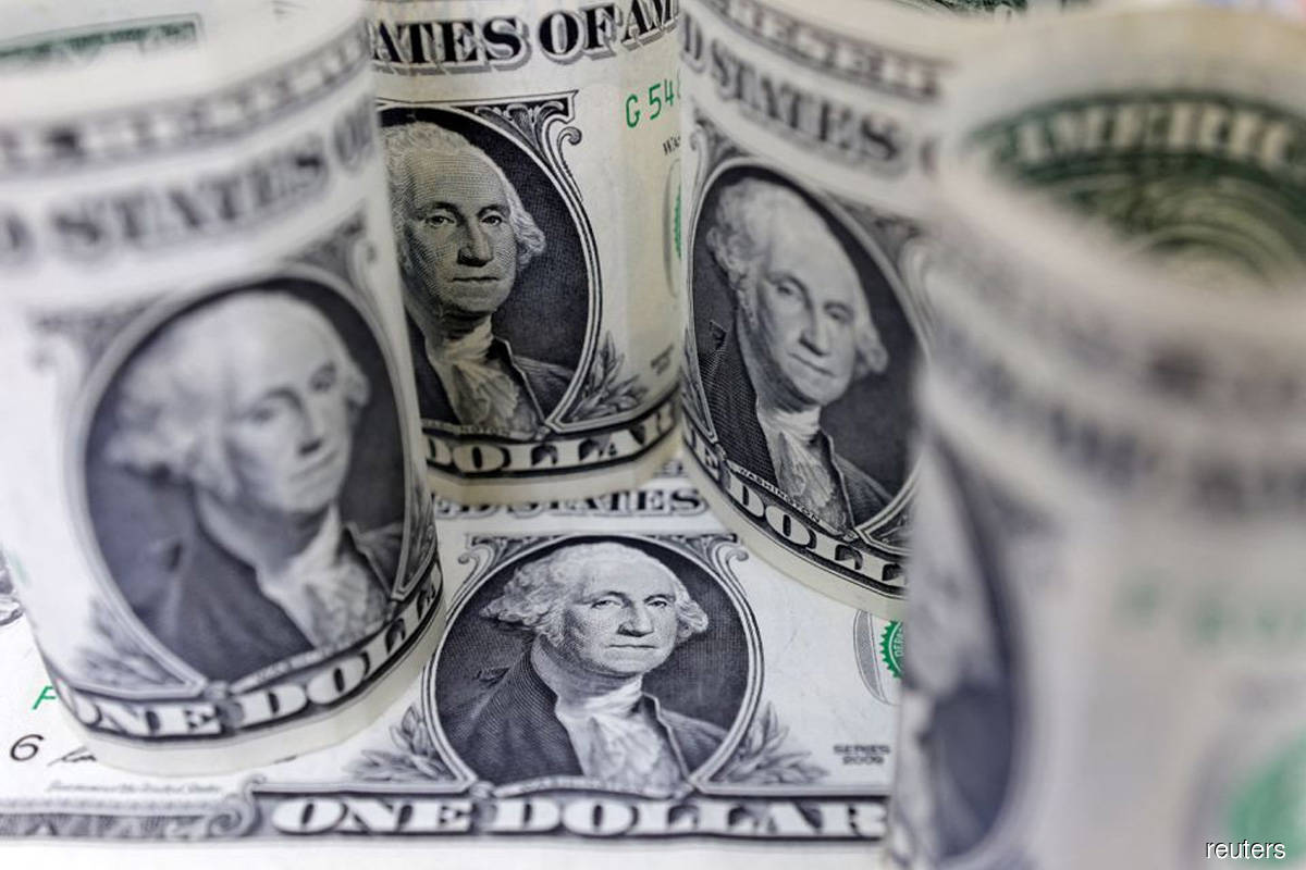 Dollar gains as traders gird for higher US rates