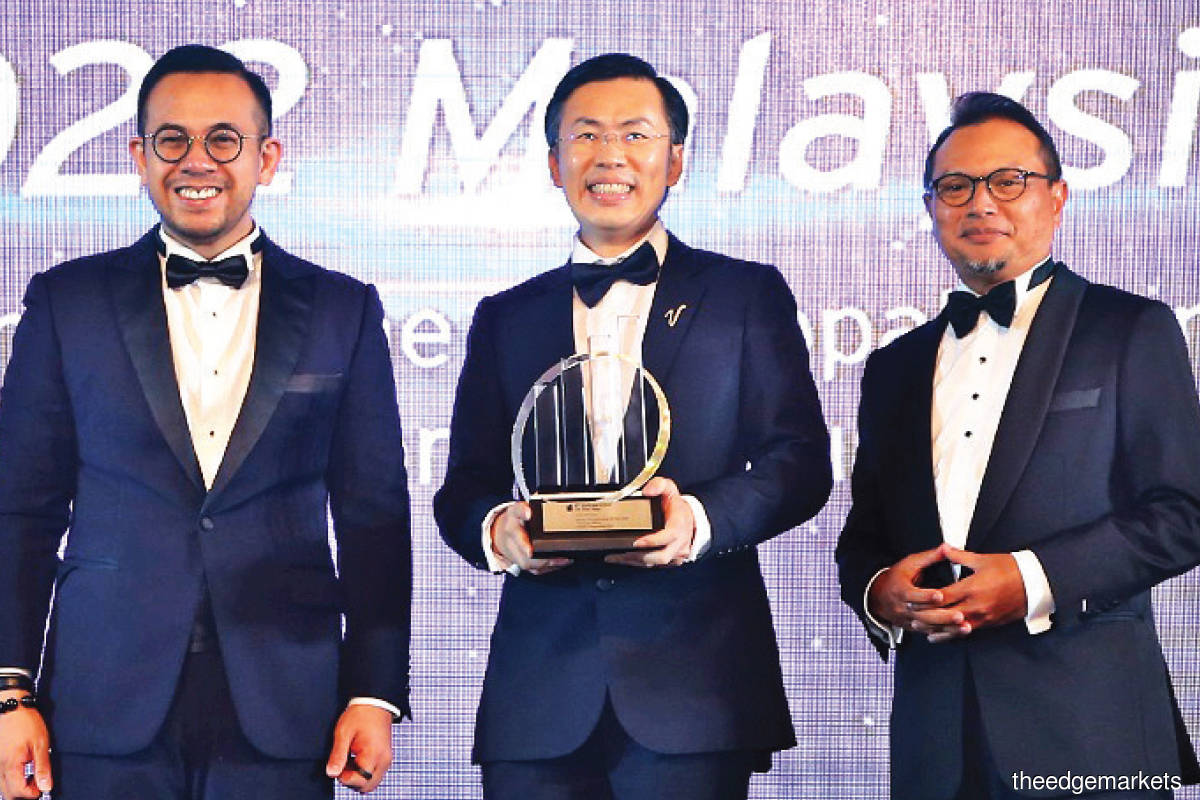 From left: Sim, Chu and Abdul Rauf after Chu was named  EY Entrepreneur Of The Year 2022, Malaysia, at an elegant black-tie event