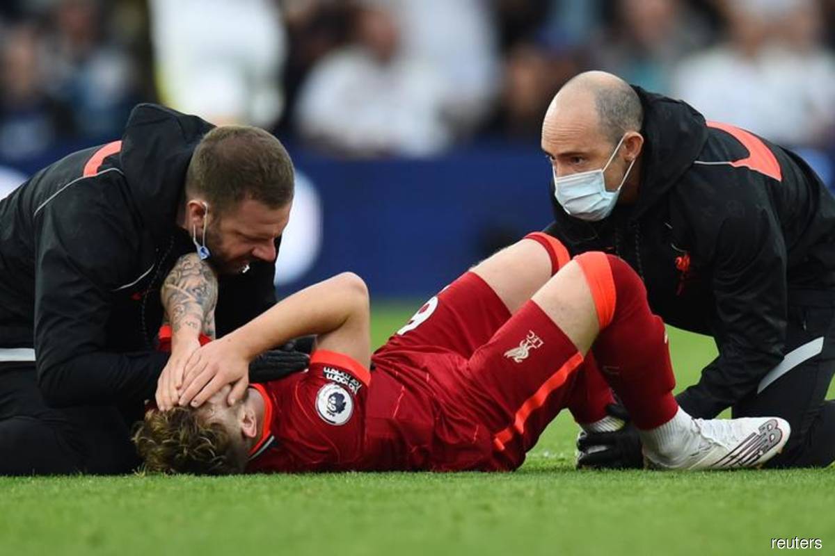 Liverpool's Elliott's needs surgery after serious ankle injury