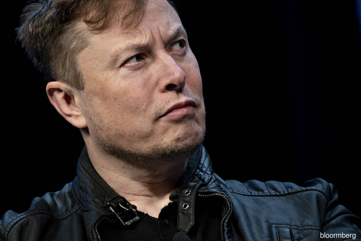 Musk lashes out at unhappy investor as Tesla shares retreat
