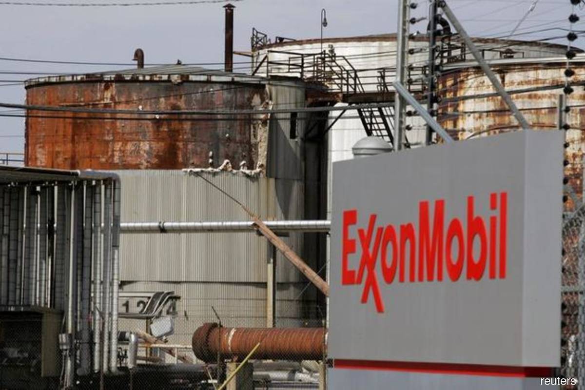 JP Morgan turns positive as Exxon cuts win back Wall St