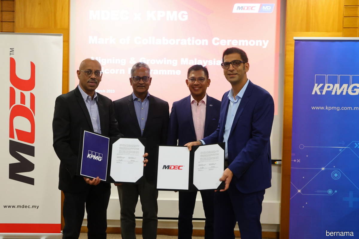 (From left): MDEC director A Balasubramaniam, MDEC head of digital export Gopi Ganesalingam, KPMG Malaysia MD Datuk Johan Idris and KPMG executive director Ubaid Mustafa Qadiri