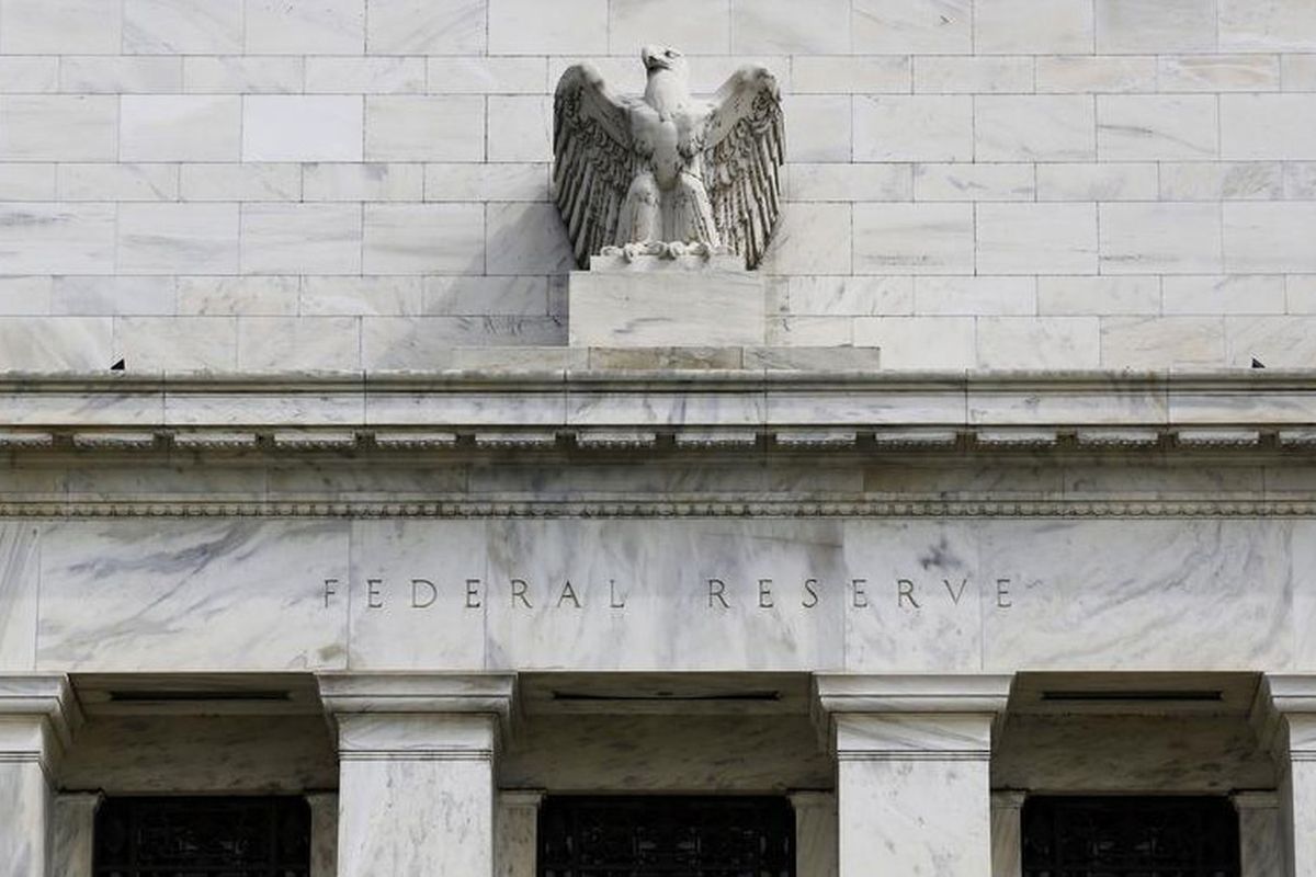 Fed unveils biggest rate hike since 1994, flags slowing economy
