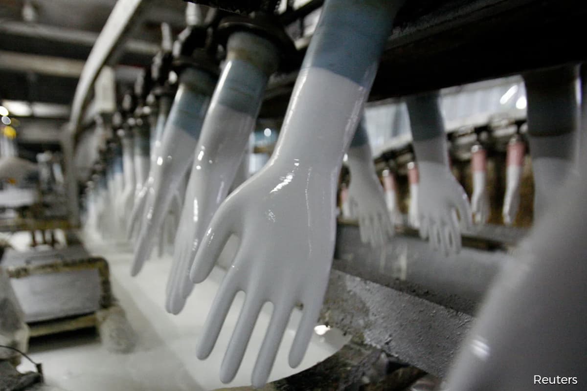 Glove shares slump on profit taking