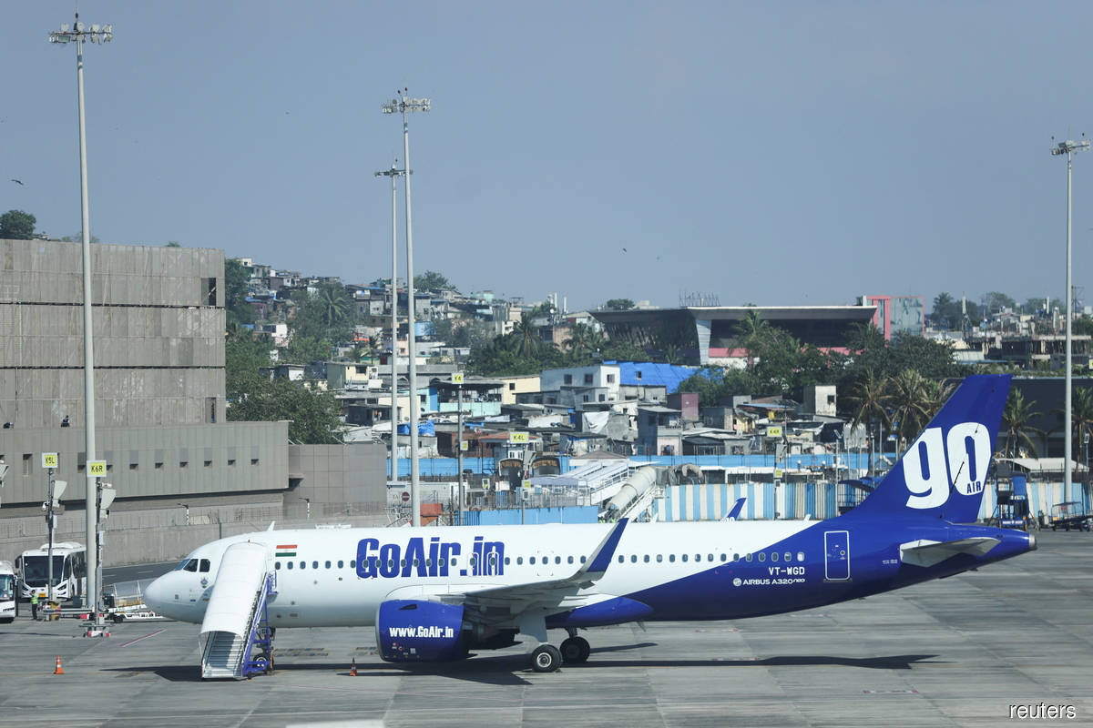 A Go First airline, formerly known as GoAir, passenger aircraft parked at the Mumbai airport. Go Airlines on May 8 called on India's company law tribunal to urgently pass an order on its bankruptcy plea.